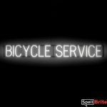 BICYCLE SERVICE sign, featuring LED lights that look like neon BICYCLE SERVICE signs