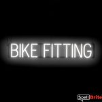 BIKE FITTING sign, featuring LED lights that look like neon BIKE FITTING signs