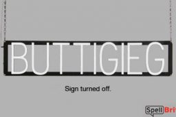 BUTTIGIEG sign, featuring LED lights that look like neon BUTTIGIEG signs