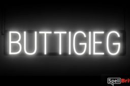 BUTTIGIEG sign, featuring LED lights that look like neon BUTTIGIEG signs