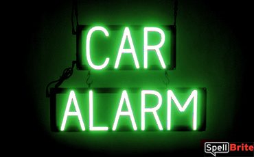 CAR ALARM sign, featuring LED lights that look like neon CAR ALARM signs