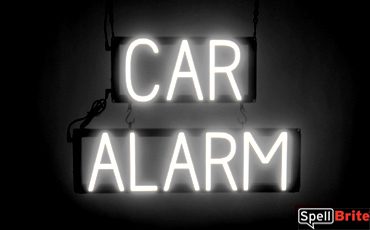 CAR ALARM sign, featuring LED lights that look like neon CAR ALARM signs