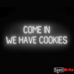 COME IN WE HAVE COOKIES sign, featuring LED lights that look like neon COME IN WE HAVE COOKIES signs