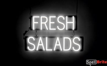 FRESH SALADS sign, featuring LED lights that look like neon FRESH SALADS signs