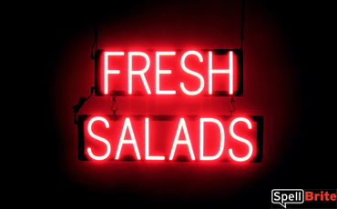 FRESH SALADS sign, featuring LED lights that look like neon FRESH SALADS signs