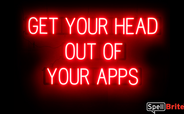 GET YOUR HEAD OUT OF YOUR APPS sign, featuring LED lights that look like neon GET YOUR HEAD OUT OF YOUR APPS signs