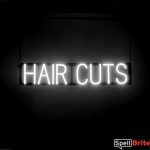 HAIR CUTS sign, featuring LED lights that look like neon HAIR CUT signs
