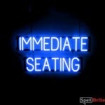 IMMEDIATE SEATING sign, featuring LED lights that look like neon IMMEDIATE SEATING signs