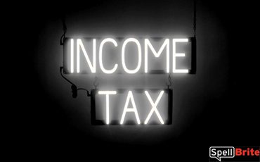 INCOME TAX sign, featuring LED lights that look like neon INCOME TAX signs