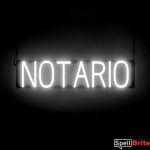 NOTARIO sign, featuring LED lights that look like neon NOTARIO signs