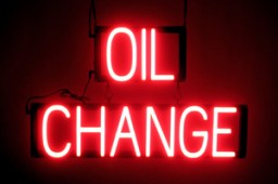 OIL CHANGE LED lighted signs that use changeable letters to make window signs for your shop