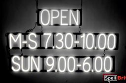 OPEN M-S 7.30-10.00 SUN 9.00-6.00 sign, featuring LED lights that look like neon OPEN M-S 7.30-10.00 SUN 9.00-6.00 signs