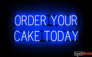 ORDER CAKE sign, featuring LED lights that look like neon ORDER CAKE signs