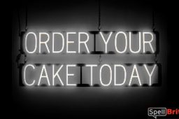 ORDER CAKE sign, featuring LED lights that look like neon ORDER CAKE signs