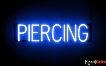 PIERCING sign, featuring LED lights that look like neon PIERCING signs