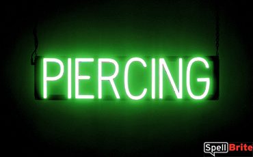 PIERCING sign, featuring LED lights that look like neon PIERCING signs