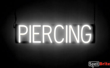 PIERCING sign, featuring LED lights that look like neon PIERCING signs