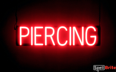 PIERCING sign, featuring LED lights that look like neon PIERCING signs