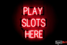 PLAY SLOTS HERE sign, featuring LED lights that look like neon PLAY SLOTS HERE signs