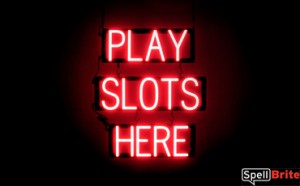 PLAY SLOTS HERE LED lighted signage that uses changeable letters to make custom signs