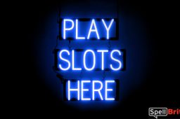 PLAY SLOTS HERE sign, featuring LED lights that look like neon PLAY SLOTS HERE signs