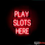 PLAY SLOTS HERE sign, featuring LED lights that look like neon PLAY SLOTS HERE signs