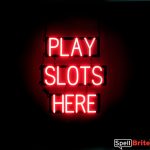 PLAY SLOTS HERE sign, featuring LED lights that look like neon PLAY SLOTS HERE signs