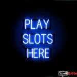 PLAY SLOTS HERE sign, featuring LED lights that look like neon PLAY SLOTS HERE signs