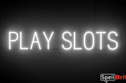 PLAY SLOTS sign, featuring LED lights that look like neon PLAY SLOTS signs