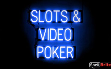 SLOTS VIDEO POKER sign, featuring LED lights that look like neon SLOTS VIDEO POKER signs