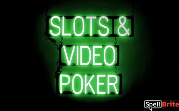 SLOTS VIDEO POKER sign, featuring LED lights that look like neon SLOTS VIDEO POKER signs