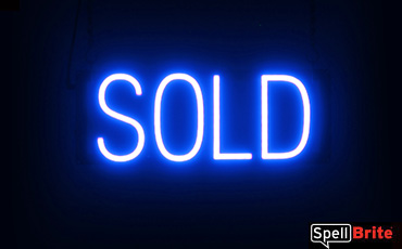 Sold sign, featuring LED lights that look like neon Sold signs