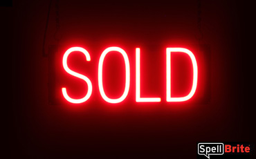 Sold sign, featuring LED lights that look like neon Sold signs