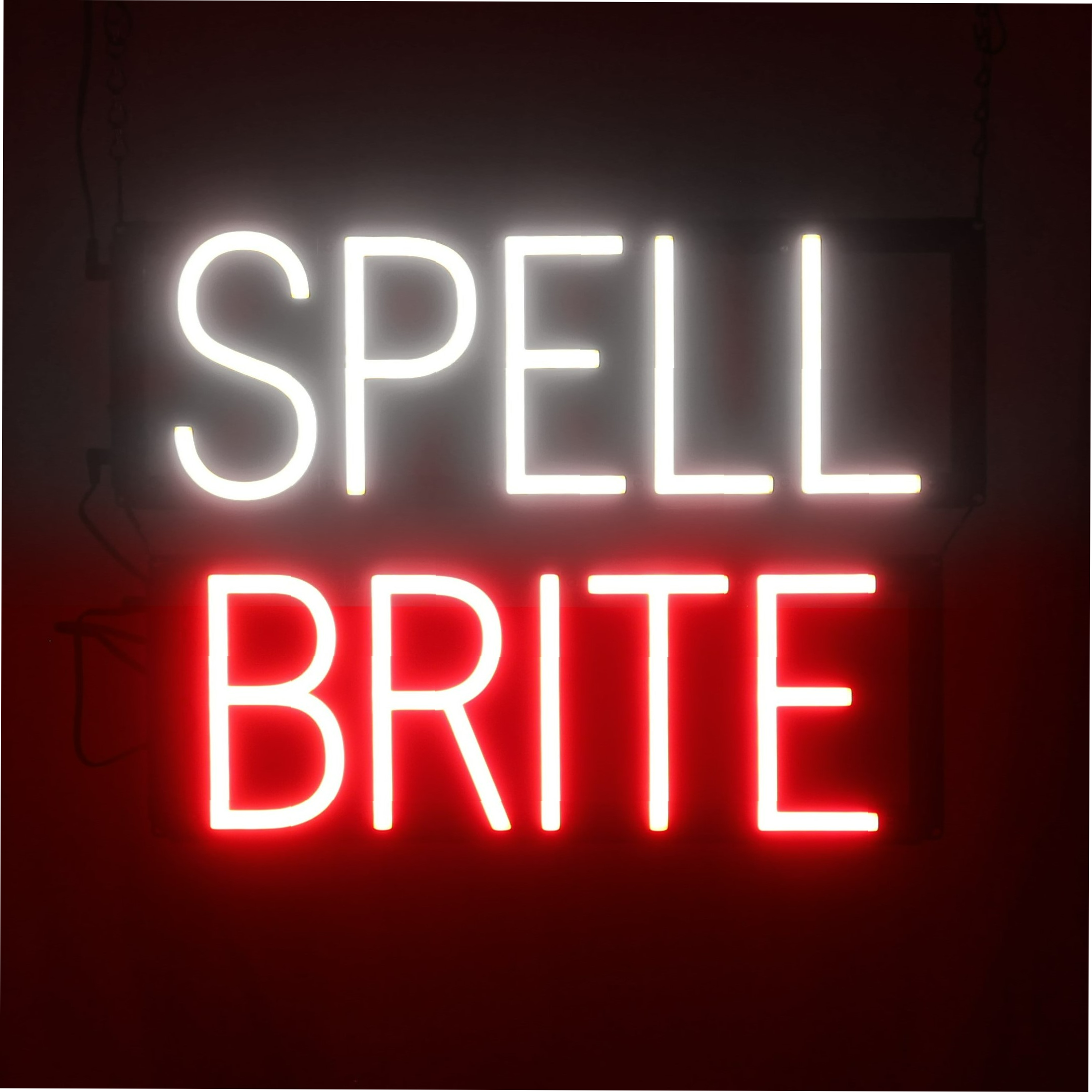 SpellBrite LED sign spelling the brand name, in white and red against a black background