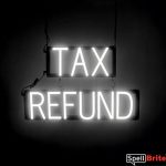 TAX REFUND sign, featuring LED lights that look like neon TAX REFUND signs