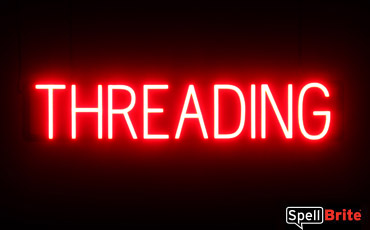 THREADING sign, featuring LED lights that look like neon THREADING signs