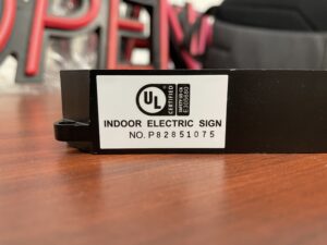 Image of UL designation on SpellBrite’s neon-like LED signs’ endcap
