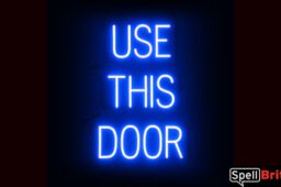 USE THIS DOOR Sign – SpellBrite’s LED Sign Alternative to Neon USE THIS DOOR Signs for Businesses in Blue