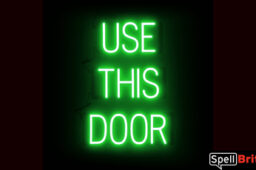 USE THIS DOOR sign, featuring LED lights that look like neon USE THIS DOOR signs