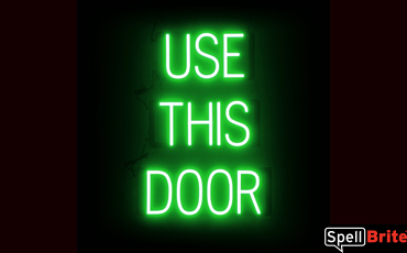 USE THIS DOOR sign, featuring LED lights that look like neon USE THIS DOOR signs