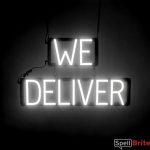 WE DELIVER sign, featuring LED lights that look like neon WE DELIVER signs
