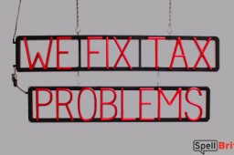 WE FIX TAX PROLEMS sign, featuring LED lights that look like neon WE FIX TAX PROLEMS signs