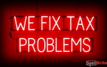 WE FIX TAX PROLEMS sign, featuring LED lights that look like neon WE FIX TAX PROLEMS signs