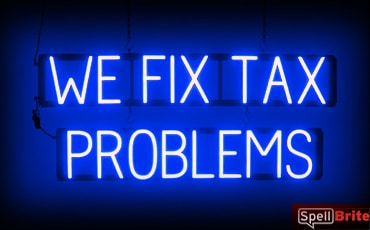 WE FIX TAX PROLEMS sign, featuring LED lights that look like neon WE FIX TAX PROLEMS signs