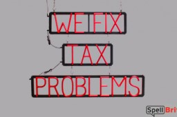 WE FIX TAX PROLEMS sign, featuring LED lights that look like neon WE FIX TAX PROLEMS signs