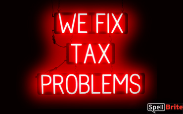 WE FIX TAX PROLEMS sign, featuring LED lights that look like neon WE FIX TAX PROLEMS signs