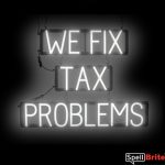 WE FIX TAX PROLEMS sign, featuring LED lights that look like neon WE FIX TAX PROLEMS signs