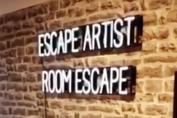 One of SpellBrite’s custom neon signs (which use an LED light source) to advertise “Escape Artist Room Escape.”