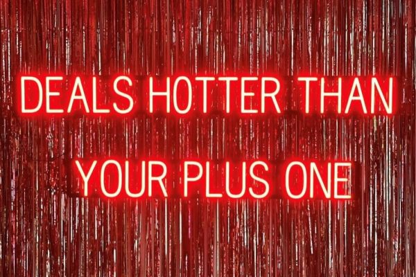 Creative LED neon sign from Sportique Scooters letting customers know they’ve got “Deals Hotter Than Your Plus One”